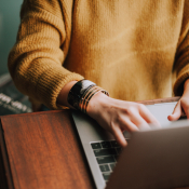 photo of person using laptop computer